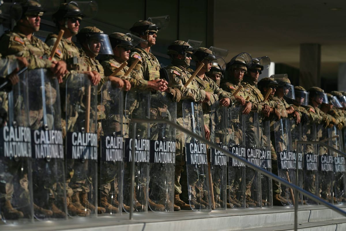Commentary: Trump’s deployment of the National Guard to fight crime blurs the legal distinction between the police and the military